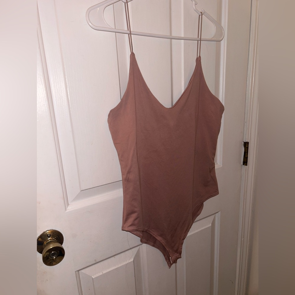 dusty pink spaghetti strap bodysuit. Size M.